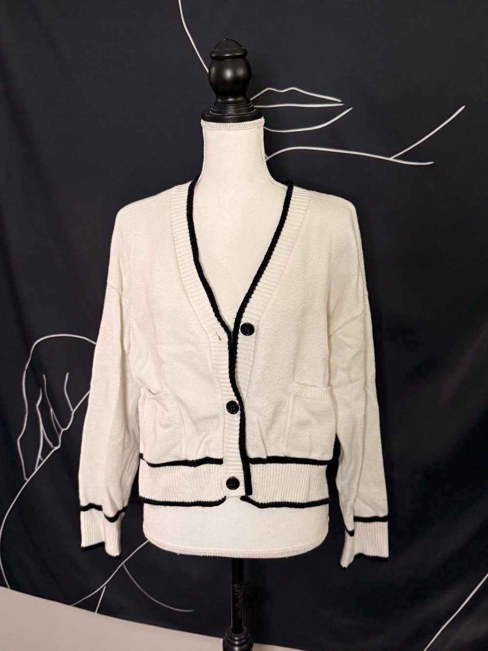 Cream Cardigan with Black Trim and detailing